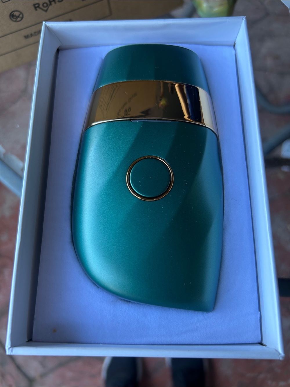 Teal and Gold Compact Hair Removal Accessory - Sleek Hair Styling Tool